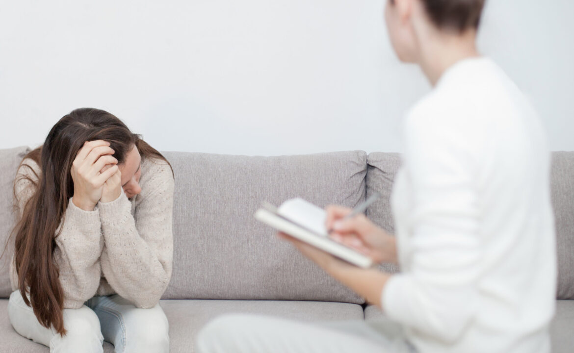 a-young-woman-at-the-therapy-session-psychology-th-CNFZF3D-scaled